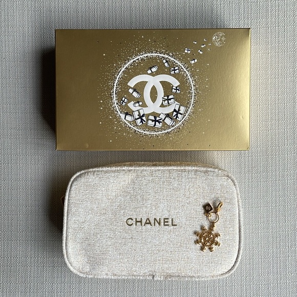CHANEL Handbags - CHANEL limited edition holiday Cosmetic Pouch with snowflake charm